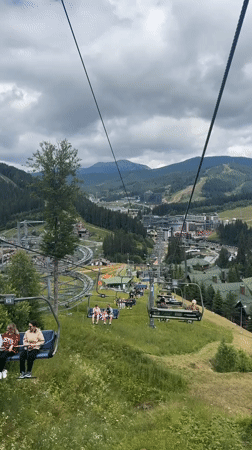 Summer day at Bukovel resort, chairlifts and mountain views