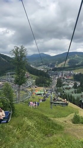 Summer day at Bukovel resort, chairlifts and mountain views