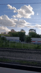 Sunny afternoon urban scenes documented across Khimki, Russia