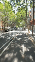 Casual cycling and scootering through sunny Barcelona streets and beachfront