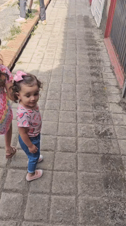 Family life moments captured in Mexican neighborhood