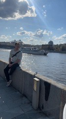 Sunny afternoon riverside activity documented near Moscow's Peter Great Statue