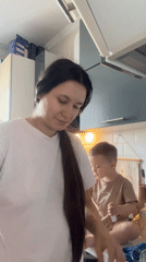 Mother and child share kitchen moment in Odintsovo