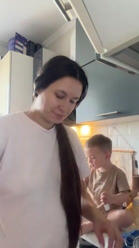 Mother and child share kitchen moment in Odintsovo