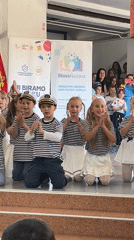 Children perform sailor-themed dance in Montenegro coastal town