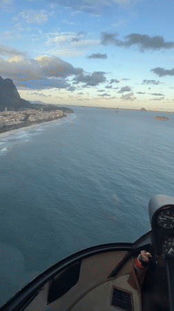 Helicopter observed flying over ocean near Rio de Janeiro