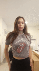 Woman in Rolling Stones shirt spotted in Buenos Aires apartment