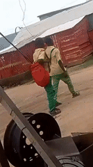 Daily life unfolds near rural school community