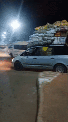 Evening street life documented in Bukuru, Nigeria