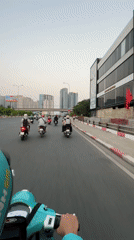 Scooter rider captures street scene in Thủ Đức, Vietnam