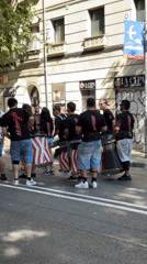 Street drummers perform in coordinated outfits in Barcelona