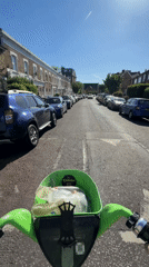 Morning Lime scooter ride through residential London street