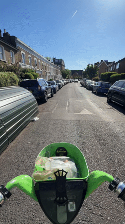 Morning Lime scooter ride through residential London street