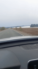 Car journey through rural Russian landscape near Niva documented