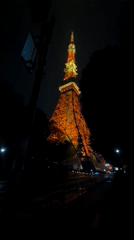 Tokyo Tower captured illuminated in orange and white at night