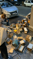 Book pile draws crowd on Buenos Aires street