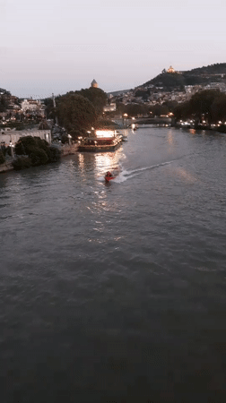 Tbilisi's Kura riverfront comes alive at dusk