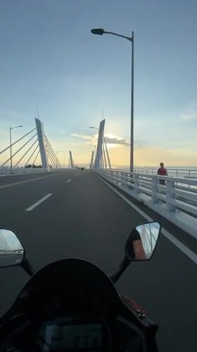 Motorcycle rider captures sunset to dusk journey through Davao City