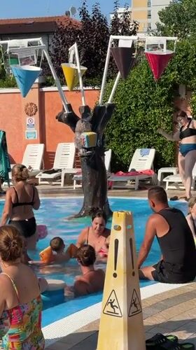 Crowded summer pool day in Gatteo, Italy