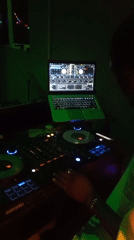 DJ set and pool games captured at nightclub venue