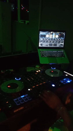 DJ set and pool games captured at nightclub venue