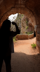 Woman exits tunnel in Petrovac, Montenegro