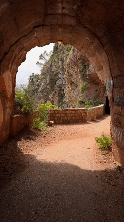 Woman exits tunnel in Petrovac, Montenegro