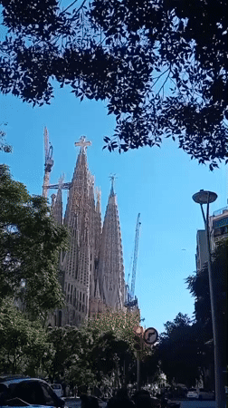 Visitor documents Sagrada Familia's ongoing construction in Barcelona