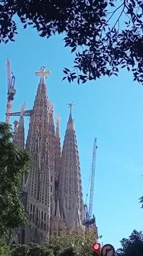 Visitor documents Sagrada Familia's ongoing construction in Barcelona