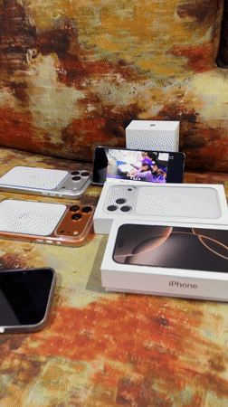 Multiple iPhones displayed at Shahapur residence with children, dog present