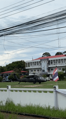 Police helicopter parked at station in Thong Sala, Thailand