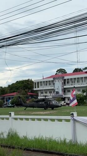 Police helicopter parked at station in Thong Sala, Thailand