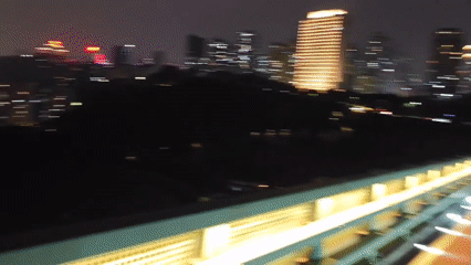 Night traffic and illuminated walkways observed in Chongqing district