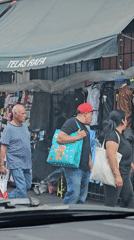 Evening street scenes capture daily life in historic Puebla