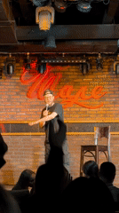 Standup comedy performance documented in Klin, Russia venue