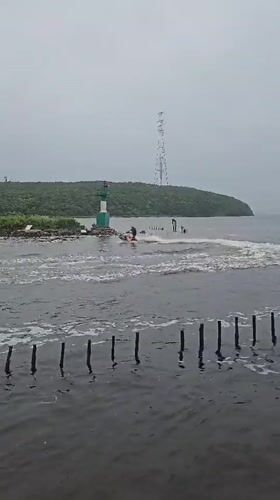 Jet skiing near a Vladivostok lighthouse on choppy morning water