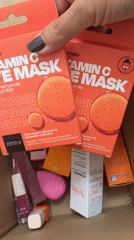 Person unpacks beauty products from box in Milan