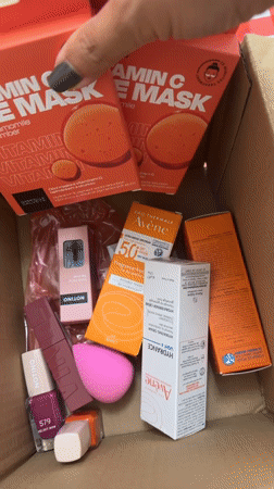 Person unpacks beauty products from box in Milan