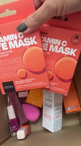 Person unpacks beauty products from box in Milan