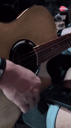 Guitar Session with Drink Captured in Depok, Indonesia