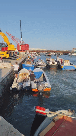 Busy morning activity at a Venice waterfront dock