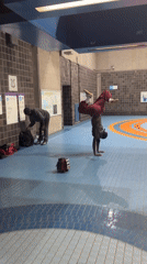 Man performs handstand in Montreal subway station