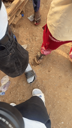 Street activity documented in Abuja market area