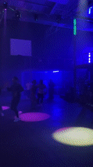 Live performance captured at Venezuela venue with dynamic lighting