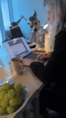 London office worker documents afternoon desk snacking session