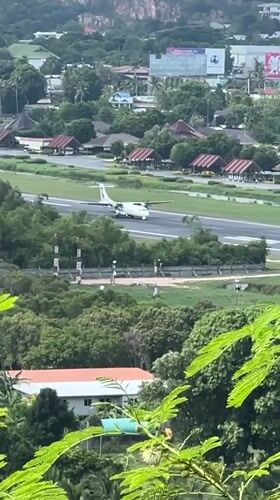 Small plane lands at rural Thailand airfield