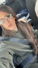 Woman in Champion hoodie travels as passenger in Kazichene