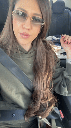Woman in Champion hoodie travels as passenger in Kazichene