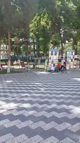 Morning documentation of Tashkent park features and surroundings