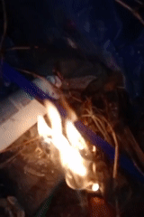 Trash fires burn in Buketteukuh, Indonesia amid scattered debris